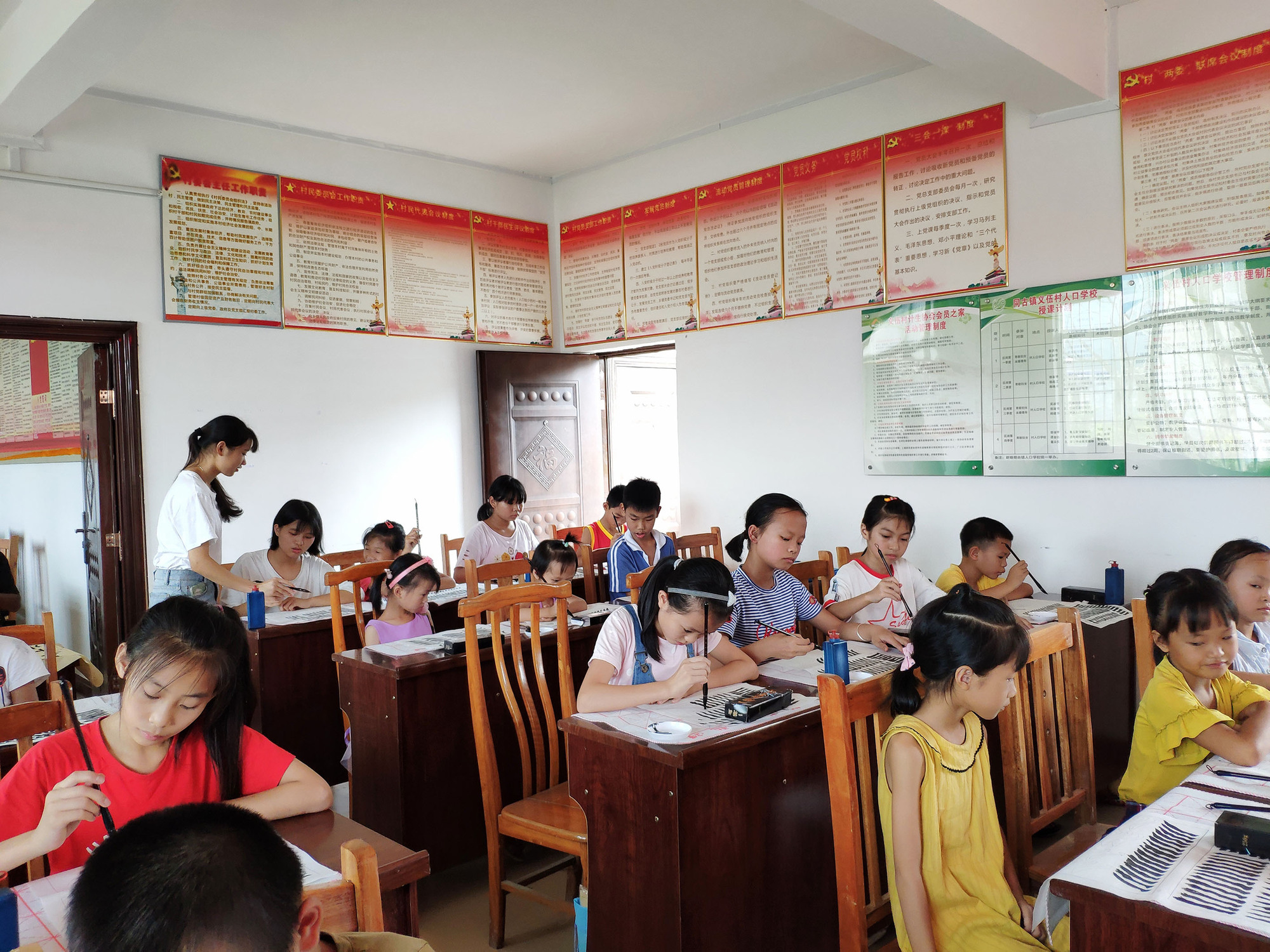 7月30  同古义伍村 书法免开.jpg